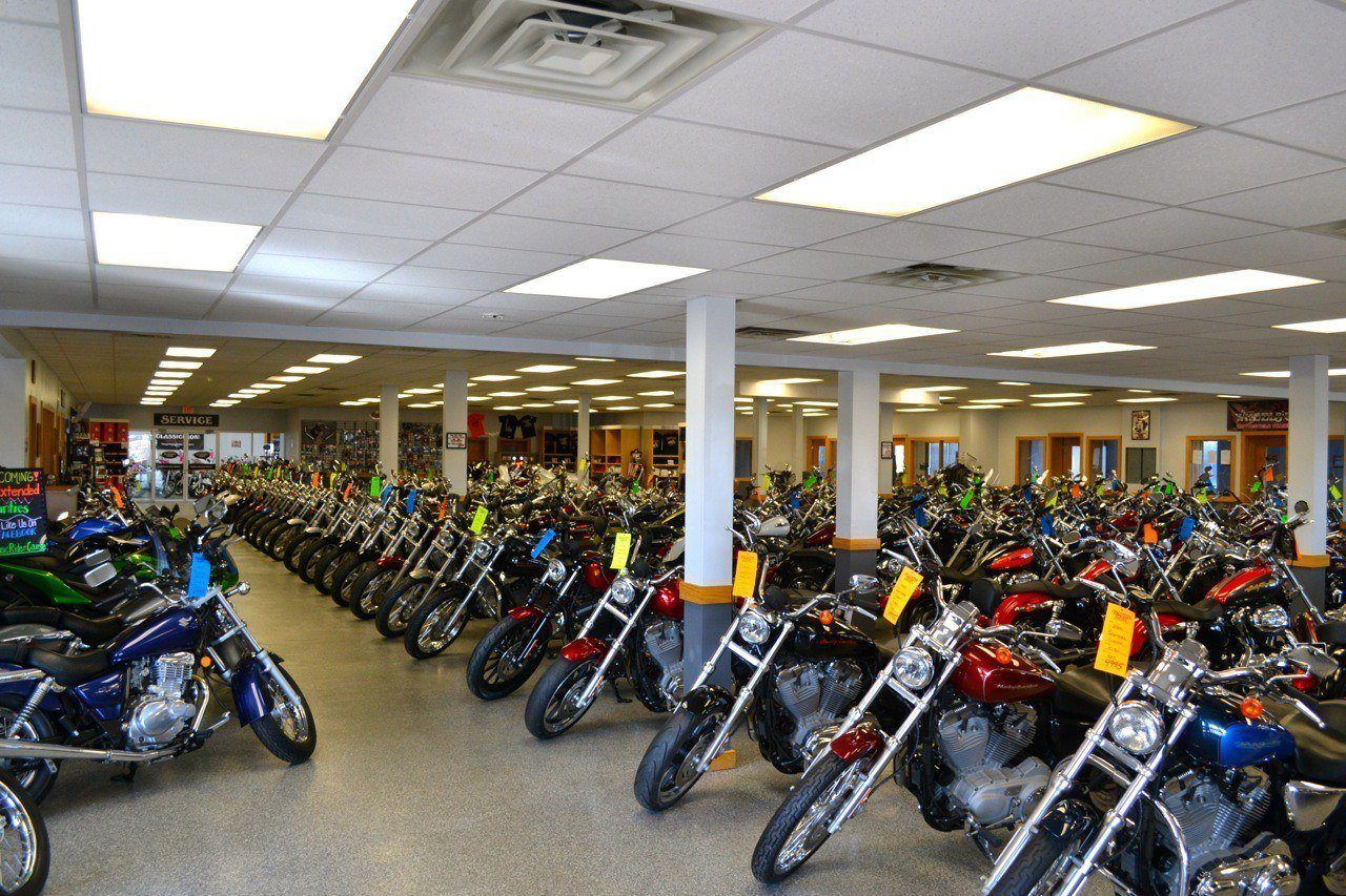 Rows of motorcycles on the showroom floor